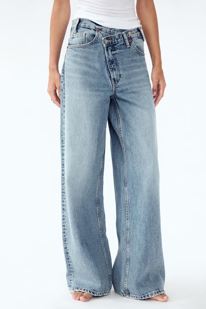 High Rise Baggy Cross Over Jeans in Light Blue