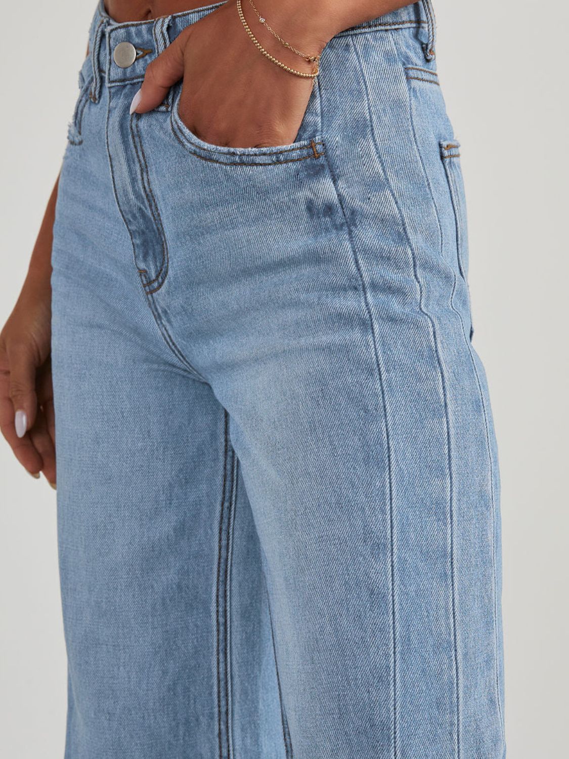 High Rise Raw Hem Jeans in Washed Light Blue