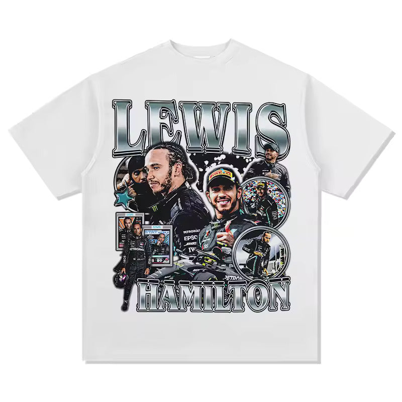 “Model wearing a Lewis Hamilton inspired loose box-fit t-shirt in a relaxed streetwear style. The t-shirt features bold, minimal race-inspired graphics on premium heavyweight cotton, with an oversized fit and dropped shoulders. Urban backdrop emphasizes a modern, confident look.”
