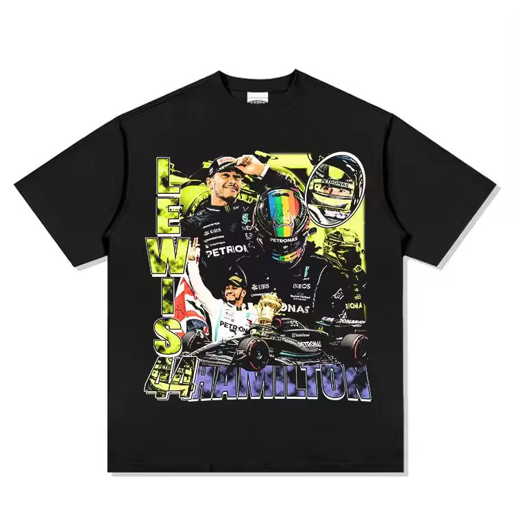“Model wearing a Lewis Hamilton inspired loose box-fit t-shirt in a relaxed streetwear style. The t-shirt features bold, minimal race-inspired graphics on premium heavyweight cotton, with an oversized fit and dropped shoulders. Urban backdrop emphasizes a modern, confident look.”
