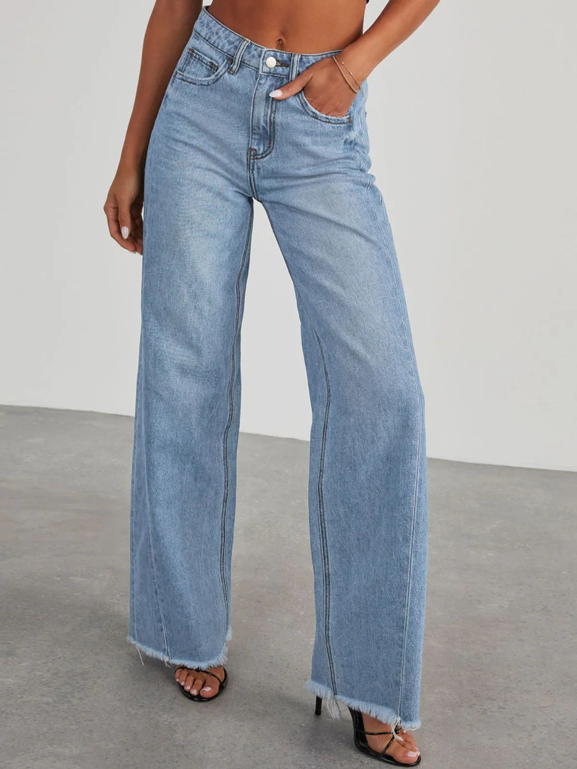 High Rise Raw Hem Jeans in Washed Light Blue
