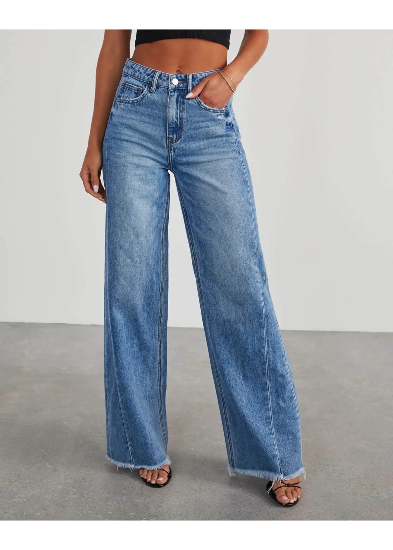 High Rise Raw Hem Jeans in Washed Blue