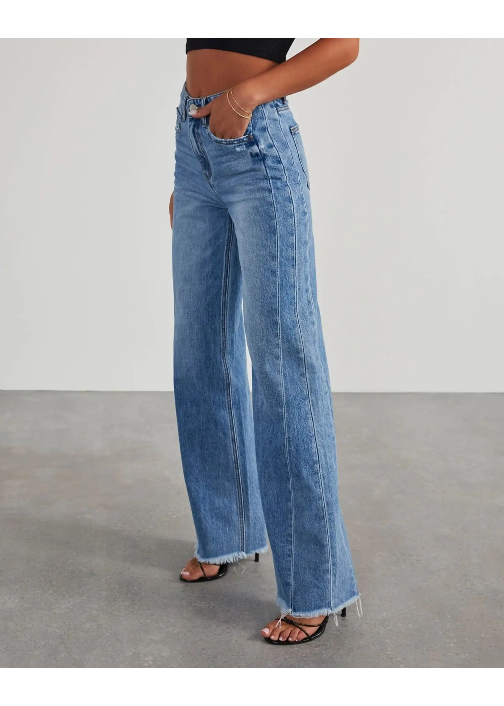 High Rise Raw Hem Jeans in Washed Blue