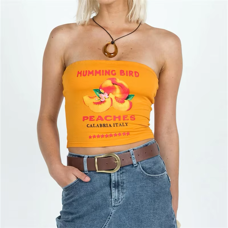 "Colorful graphic strapless bandeau tube top with a 'PEACHES' print, offering a flattering fit and a fun, retro-inspired design perfect for casual summer outfits."